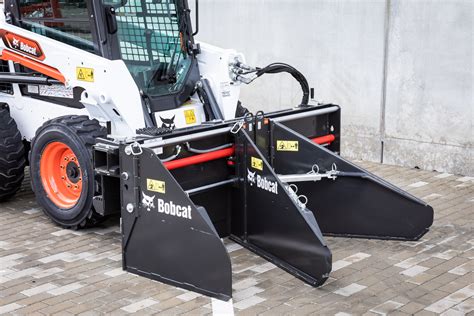 asphalt spreader box for skid steer|bobcat soil and asphalt spreader.